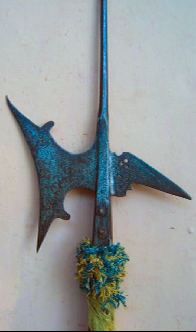 A FINE MID TO LATE SIXTEENTH CENTURY ITALIAN HALBERD, ca. 1550-1590