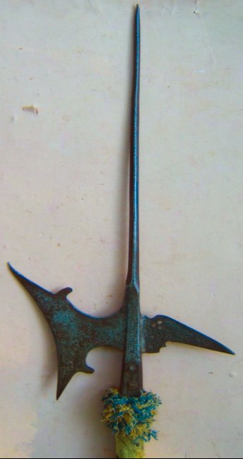 A FINE MID TO LATE SIXTEENTH CENTURY ITALIAN HALBERD, ca. 1550-1590