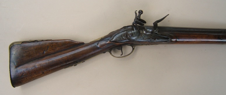 AN EXTREMELY RARE & EARLY (PRE-1728) REGULATION TYPE FIRST MODEL/LONGLAND PATTERN BROWN BESS MUSKET, ca. 1720-1728 view 1