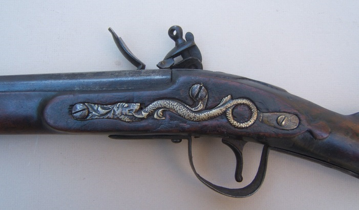 A FINE+ & RARE ORIGINAL FLINTLOCK NORTH WEST LONG TRADE GUN, BY PARKER & FIELD, dtd. 1874 view 4