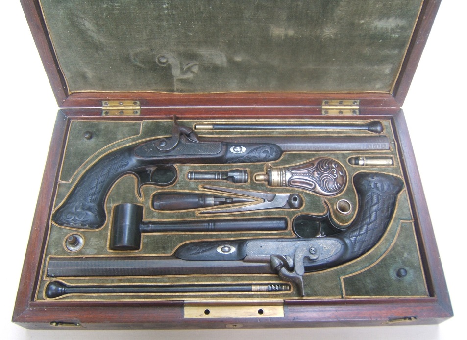  A VERY GOOD & EARLY CASED PAIR OF CONTINENTAL PERCUSSION TARGET PISTOLS, ca. 1850 view 1