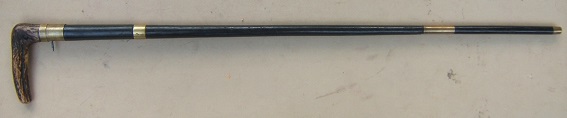 A VERY GOOD STAGHORN GRIP MID 19TH CENTURY BRASS MOUNTED FRENCH TAKEDOWN CANE-GUN, ca. 1870s view 2