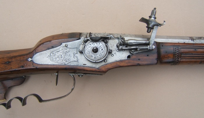 A HIGH QUALITY & UNUSUAL AUSTRIAN-HUNGARIAN/EASTERN EUROPEN (RUSSIAN?) 17TH CENTURY WHEELOCK SPORTING CARBINE w/ RELIEF CARVED & SILVER INLAYED STOCK, dtd. 1674 view 3