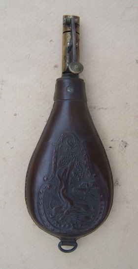 A FINE MID 19TH CENTURY EMBOSSED LEATHER SHOT FLASK, ca. 1850 view 1
