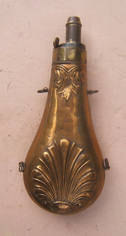 A VERY GOOD+ AMERICAN EMBOSSED COPPER POWDER FLASK, ca. 1860 view 1