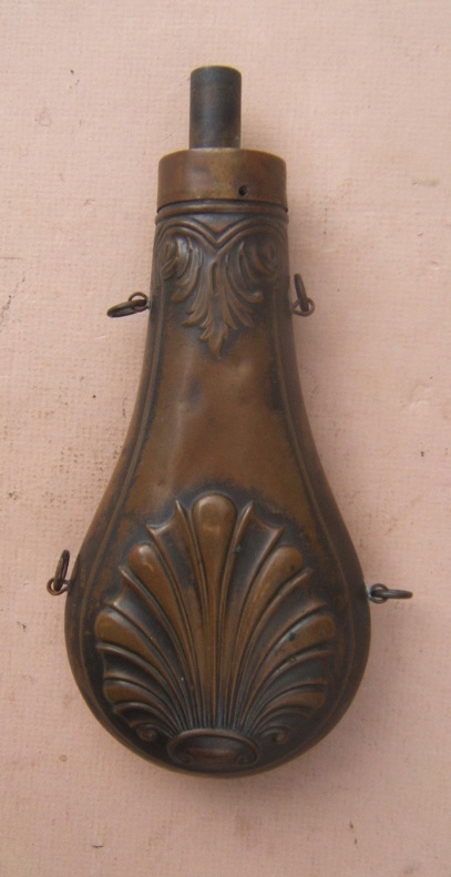 A GOOD EMBOSSED COPPER SCALLOP-SHELL POWDER FLASK, ca. 1860 view 1