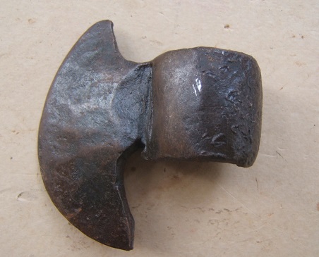 A FINE EARLY 17th CENTURY EASTERN EUROPEAN FIGHTING AXE-HEAD, ca. 1600 front