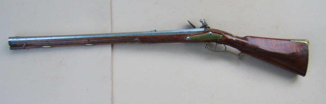 A FINE QUALITY COLONIAL PERIOD BRASS MOUNTED GERMANIC FLINTLOCK 