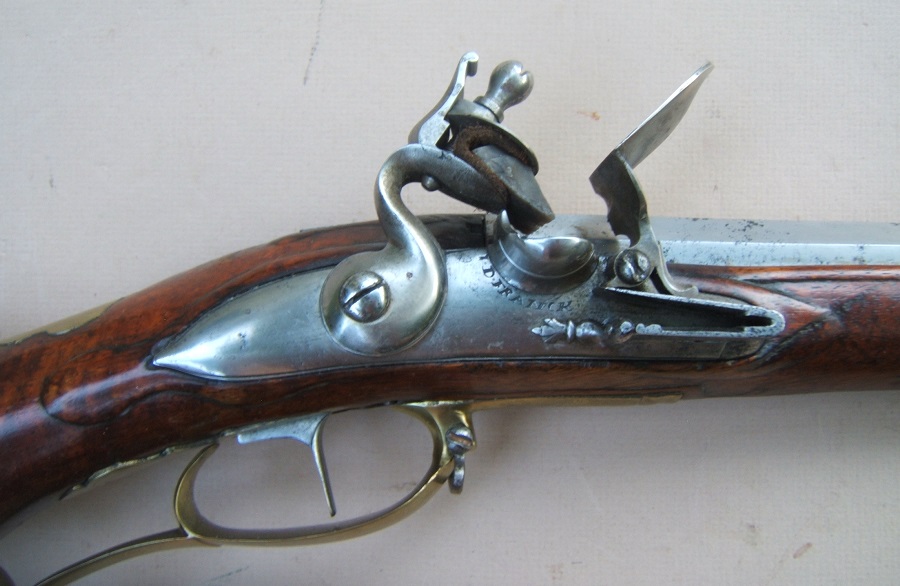A FINE QUALITY COLONIAL PERIOD BRASS MOUNTED GERMANIC FLINTLOCK 