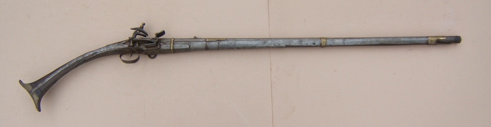  A FINE QUALITY SMALL-SIZE ALBANIAN “ALL-METAL” MIQUELET LONG-GUN, ca. 1820 view 1