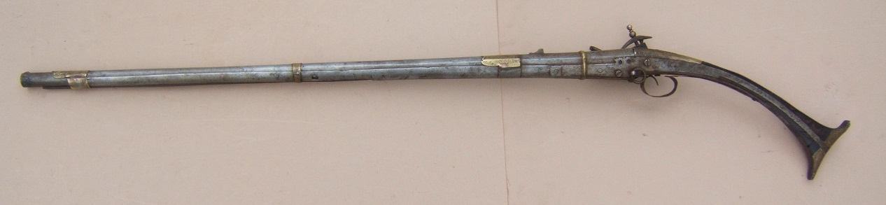 A FINE QUALITY SMALL-SIZE ALBANIAN ALL-METAL MIQUELET LONG-GUN, ca. 1820 view 2