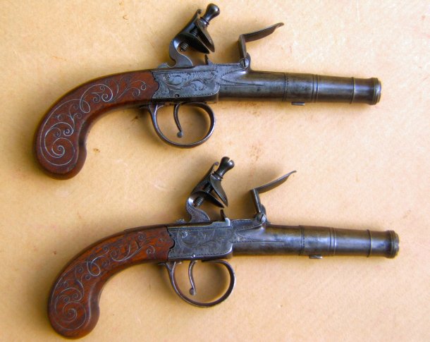 A FINE PAIR OF REVOLUTIONARY WAR PERIOD SILVER-WIRE-INLAY ENGLISH FLINTLOCK TURN-OFF HAND-WARMER (MUFF)/TRAVELLING PISTOLS, ca. 1775 view 1