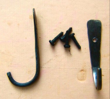 SMALL PAIR(S) OF HAND FORGED WROUGHT IRON GUN HOOKS & SCREWS view 1