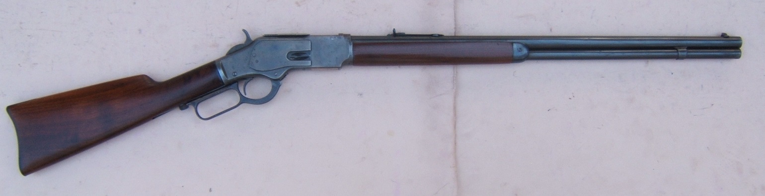 A FINE WINCHESTER MODEL 1873 RIFLE W/ CUSTOM ORDER SEMI-CRESCENT BUTTSTOCK, Sn. 389,XXX view 1