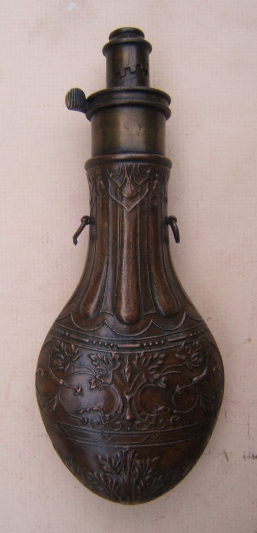 A FINE MID 19TH CENTURY EMBOSSED ENGLISH COPPER POWDER FLASK, ca. 1850s view 1