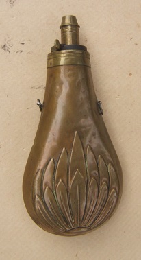 A VERY GOOD+ AMERICAN EMBOSSED BRASS SCALLOP-SHELL POWDER FLASK, ca. 1850s view 1