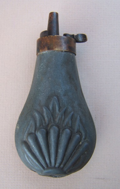 A GOOD MID-19th CENTURY SMALL-SIZED EMBOSSED ZINC POWDER FLASK, ca. 1850 view 2