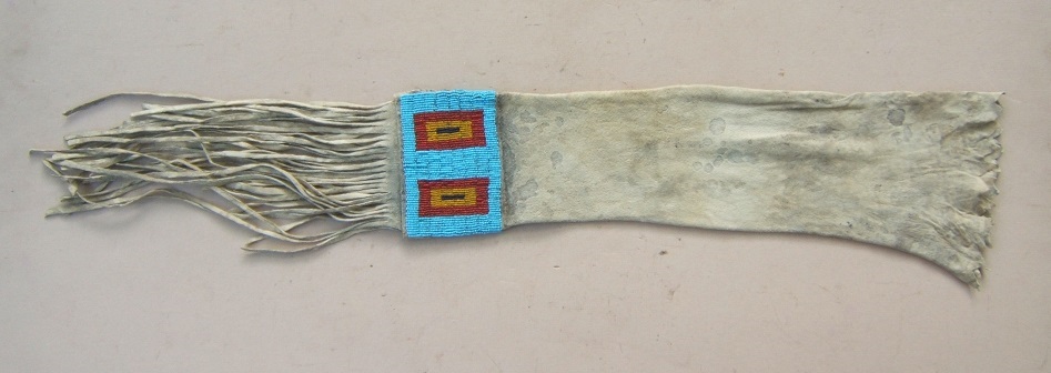 A FINE TRADE-BEAD DECORATED MID-19TH CENTURY AMERICAN PLAINS INDIAN (SIOUX) BUFFALO HIDE PIPE-BAG, ca. 1870 view2