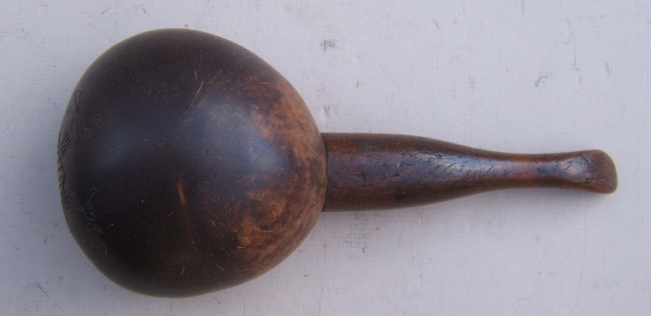 A FINE 19TH AMERICAN SAILOR-CARVED COCONUT WATER-LADLE/DIPPING-CUP, ca. 1840 view 2