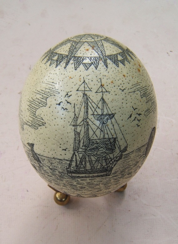A NICELY CARBED & SCRIMSHAWED 20TH CENTURY OSTRICH EGG, ca. 1990s view1