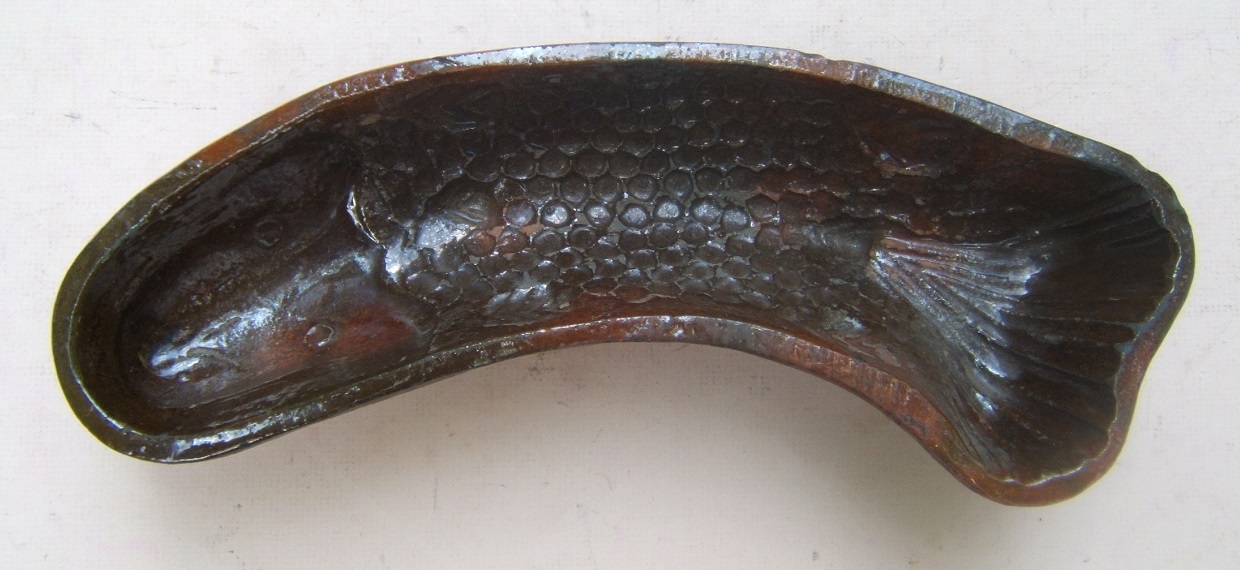 AN EARLY-MID 19TH AMERICAN (PENNSYLVANIAN) REDWARE FISH-SHAPED MOLD, ca 1840 view1