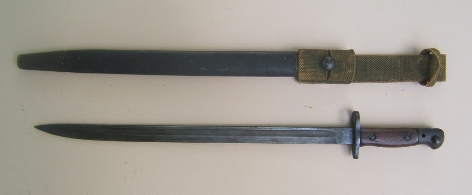 A VERY GOOD WORLD WAR I/WWII PERIOD ENGLISH (SMLE) ENFIELD P. 1907 BAYONET & SCABBARD, dtd. 1907  view 1